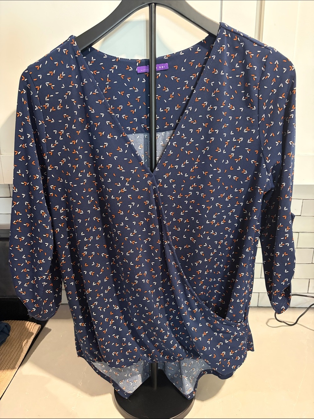 West Kei Navy Wrap-Front Blouse with Orange & White Print